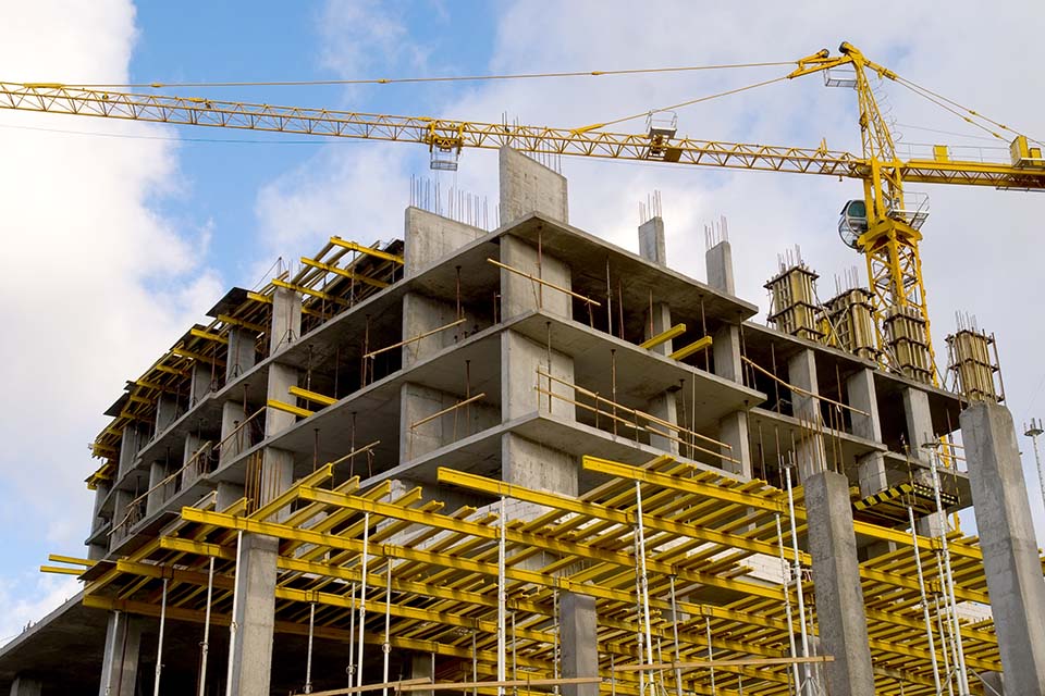 crane near building on Cloudy sky background